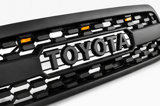Close-up of TOYOTA letters on the 2001-2004 Sequoia TRD style grille