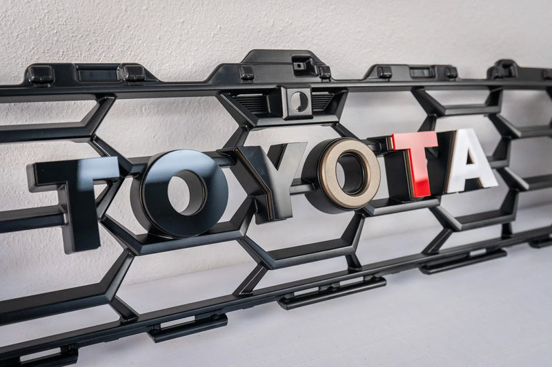 Load image into Gallery viewer, TOYOTA Front Grille Acrylic Emblem Overlays - 2025+ 4Runner TRD Pro / Trailhunter
