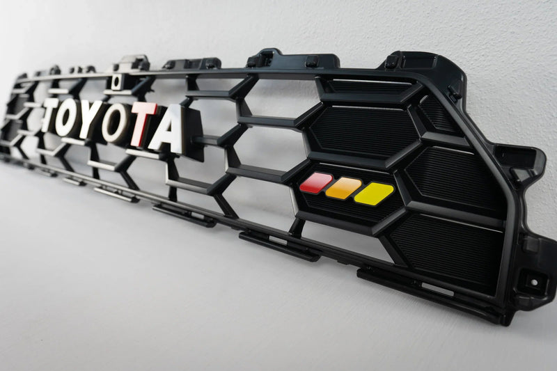 Load image into Gallery viewer, TOYOTA Front Grille Acrylic Emblem Overlays - 2025+ 4Runner TRD Pro / Trailhunter
