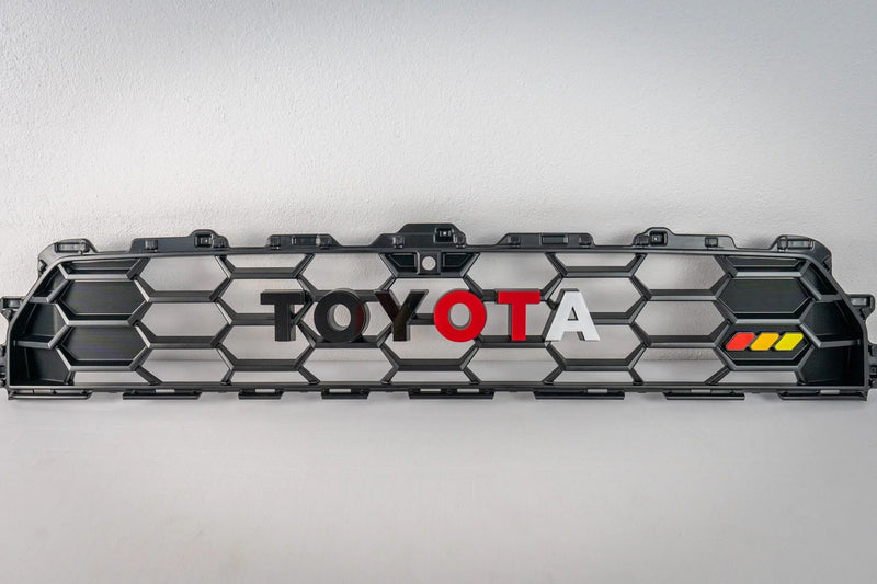 Load image into Gallery viewer, TOYOTA Front Grille Acrylic Emblem Overlays - 2025+ 4Runner TRD Pro / Trailhunter
