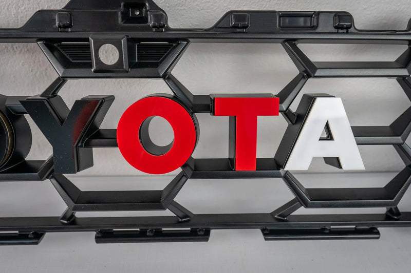 Load image into Gallery viewer, TOYOTA Front Grille Acrylic Emblem Overlays - 2025+ 4Runner TRD Pro / Trailhunter
