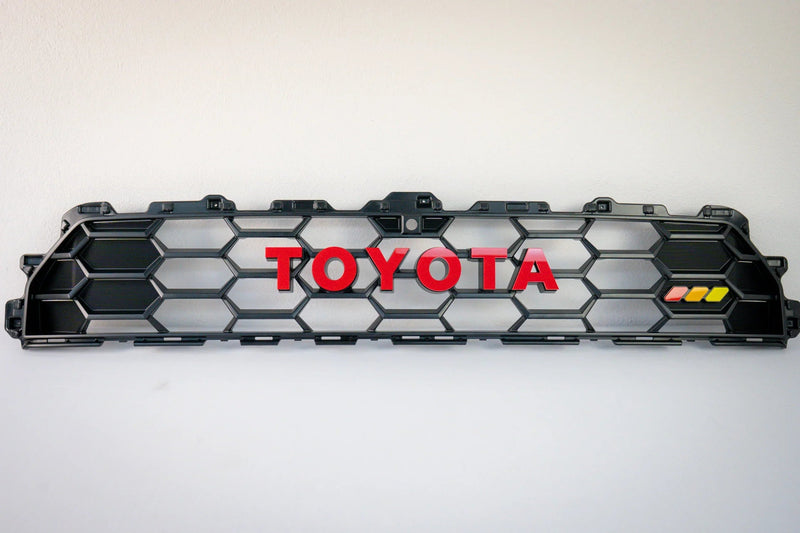 Load image into Gallery viewer, TOYOTA Front Grille Acrylic Emblem Overlays - 2025+ 4Runner TRD Pro / Trailhunter
