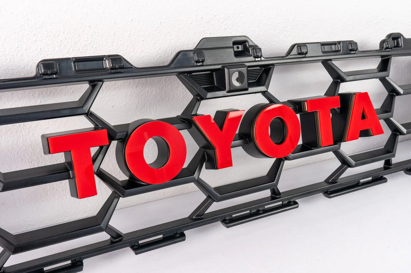 Load image into Gallery viewer, TOYOTA Front Grille Acrylic Emblem Overlays - 2025+ 4Runner TRD Pro / Trailhunter

