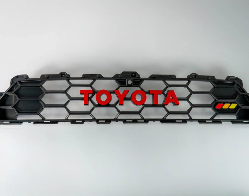 Load image into Gallery viewer, TOYOTA Front Grille Acrylic Emblem Overlays - 2025+ 4Runner TRD Pro / Trailhunter
