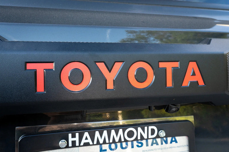 Load image into Gallery viewer, TOYOTA Emergency Reflective Rear Hatch Liftgate Emblem Overlays - 2025+ 4Runner
