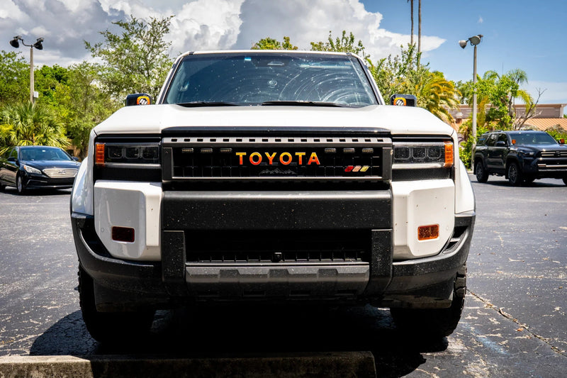 Load image into Gallery viewer, TOYOTA Simple Front Grille Emblem Overlays - 2024+ Land Cruiser
