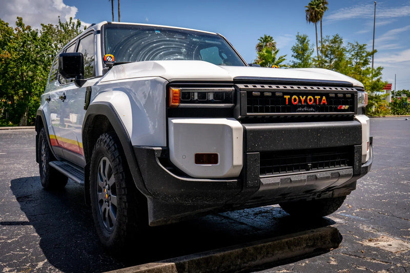 Load image into Gallery viewer, TOYOTA Simple Front Grille Emblem Overlays - 2024+ Land Cruiser
