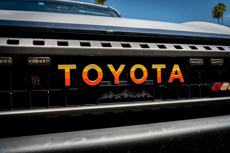 Load image into Gallery viewer, TOYOTA Simple Front Grille Emblem Overlays - 2024+ Land Cruiser
