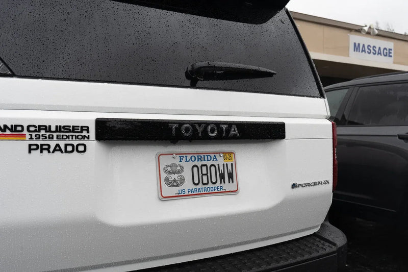 Load image into Gallery viewer, &quot;TOYOTA&quot; Topo Rear Tailgate Emblem Overlays - 2024+ Land Cruiser
