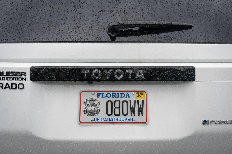 Load image into Gallery viewer, &quot;TOYOTA&quot; Topo Rear Tailgate Emblem Overlays - 2024+ Land Cruiser
