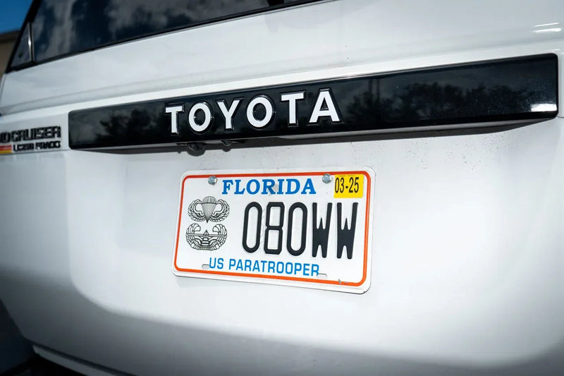 Load image into Gallery viewer, TOYOTA Emergency Reflective Rear Tailgate Emblem Overlays - 2024+ Land Cruiser
