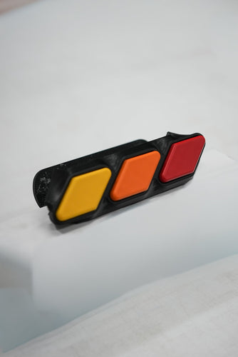 24+ Tacoma Standard Grille Badge