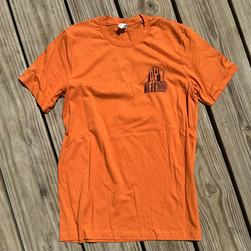 Load image into Gallery viewer, Stay Strapped T-Shirt (Tan or Orange)
