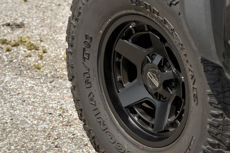 Load image into Gallery viewer, Overland Sector Atlas 17x9 -12 5x114.3/5x127mm 71.5mm Satin Black
