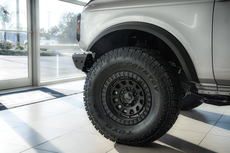Load image into Gallery viewer, Overland Sector Venture 17x9 -12 5x114.3/5x127mm 71.5mm Satin Black
