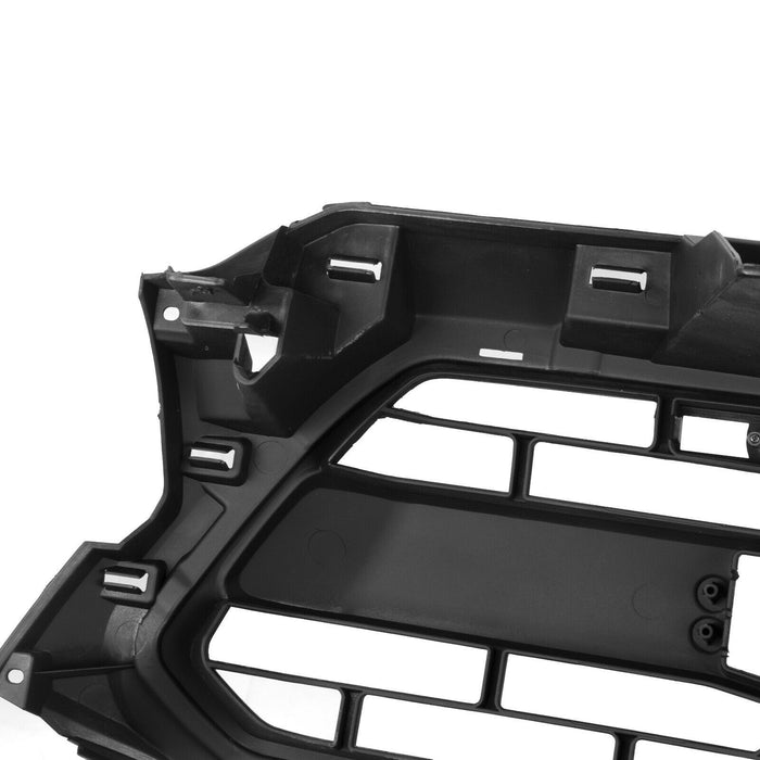 Mounting tabs and clips on the back of the 2012-2015 Tacoma grille